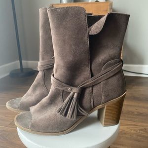 Soft brown suede open toe heeled boots.